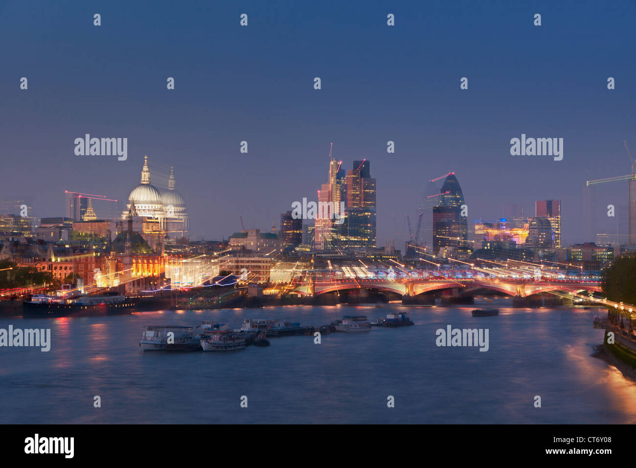 London skyline and river Thames at dusk with zoomburst effect, London, England Stock Photo