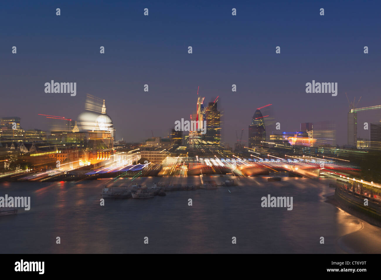 London skyline and river Thames at dusk with zoomburst effect, London, England Stock Photo