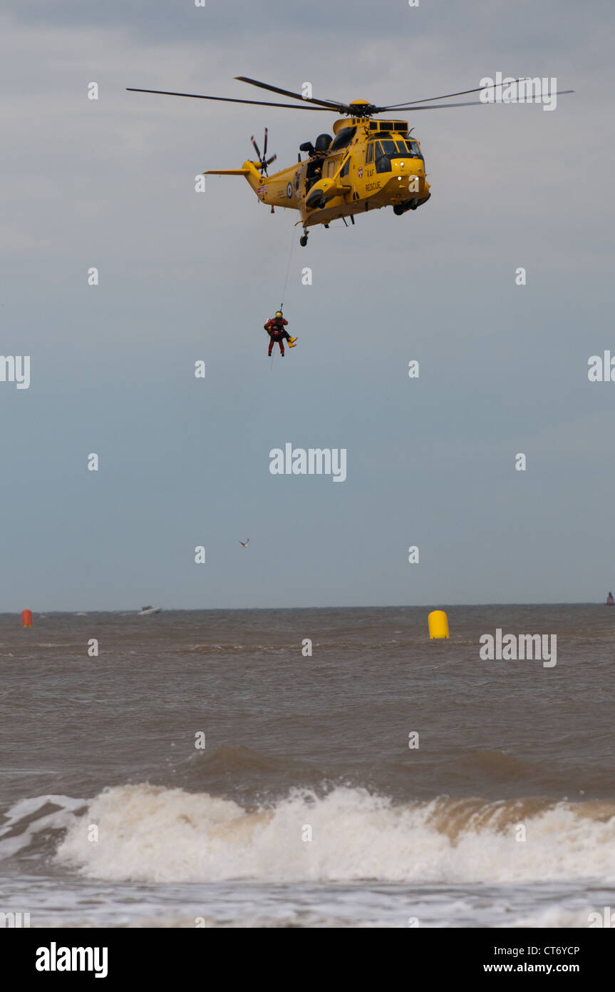 RAF SAR Sea King performing an off-shore rescue exercise at Lowestoft Airshow 2012 Stock Photo