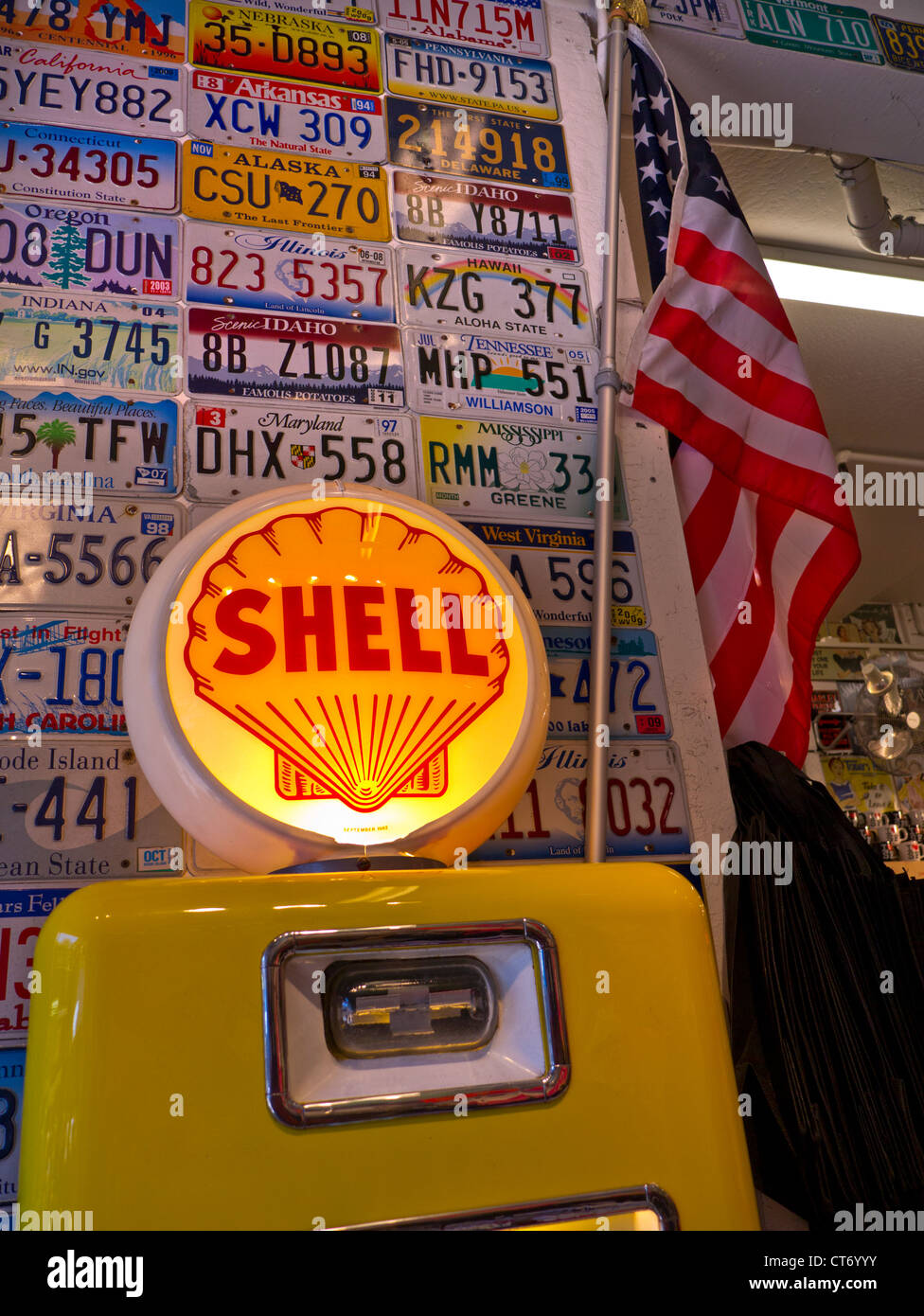 Shell petrol pump and US car plates form eye catching display at entrance to car accessories store Pier 39 San Francisco USA Stock Photo