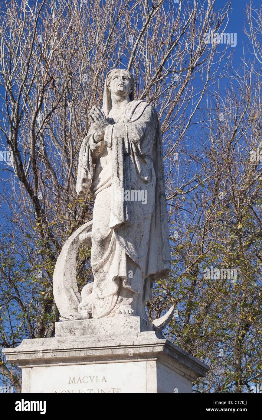 Statue of the Virgin Mary by Domenico Piggiani, Milvian bridge, Rome, Italy Stock Photo