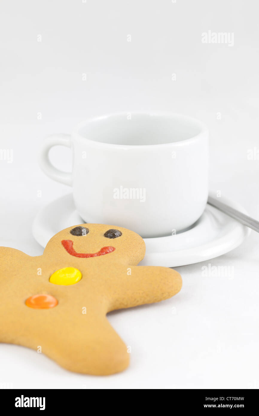 Gingerbread man with coffee cup Stock Photo
