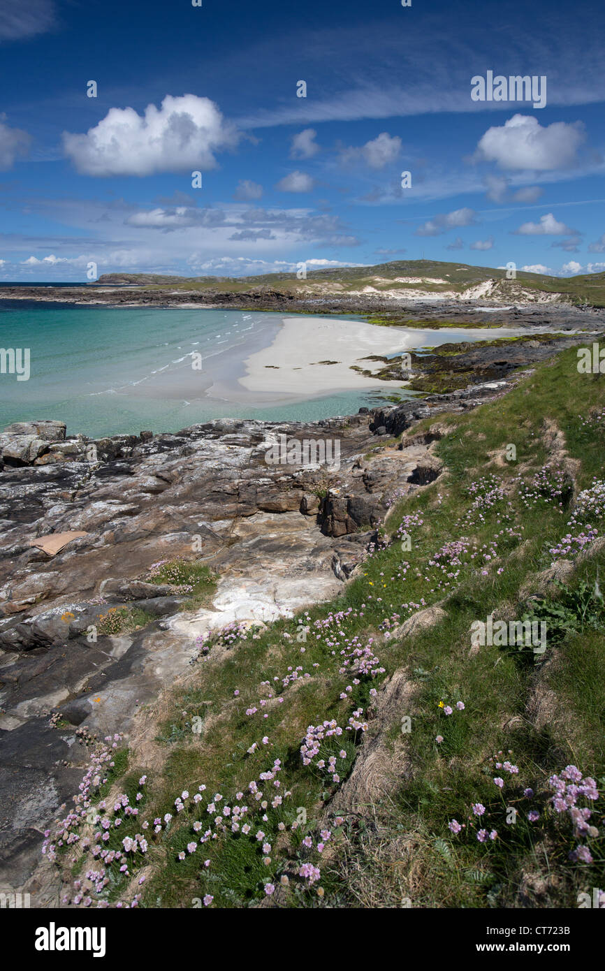 Isle of Barra, Scotland.  Picturesque view of a beach on the west coast of Barra, with Sgeir Liath in the background. Stock Photo