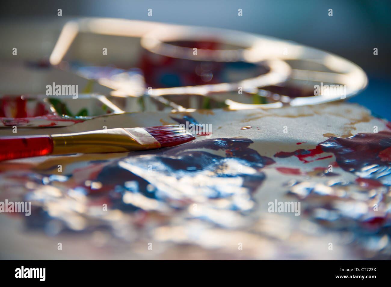 Children's paint palette and brush. Stock Photo