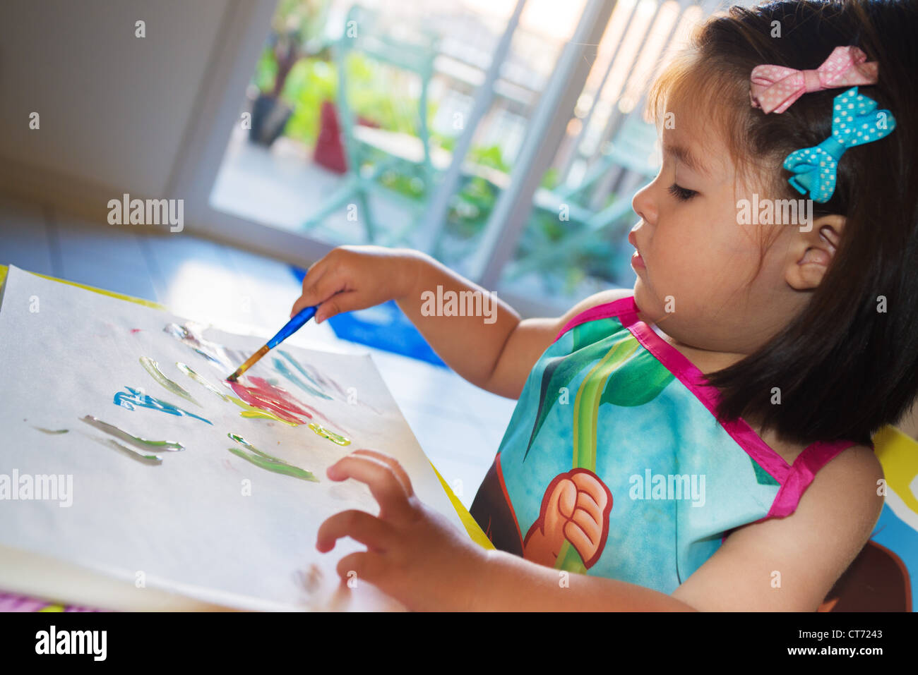 Two Year Old Playing With Paints Stock Photo Alamy