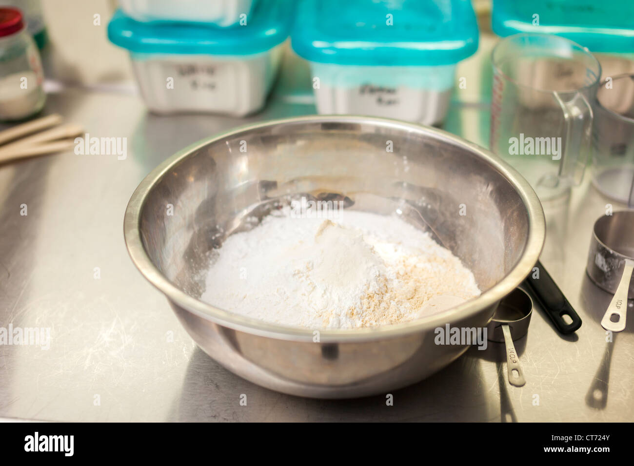 A large mixing bowl and ingredients at Tandmen Doughnuts, a small boutique bakery in Missoula, Montana. Stock Photo