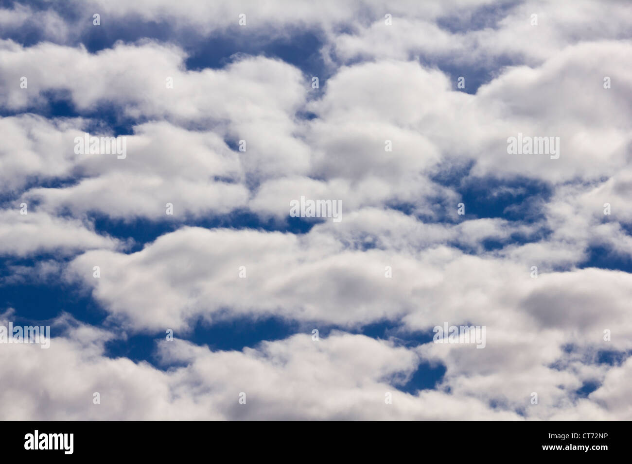White fluffy clouds and blue sky Stock Photo - Alamy