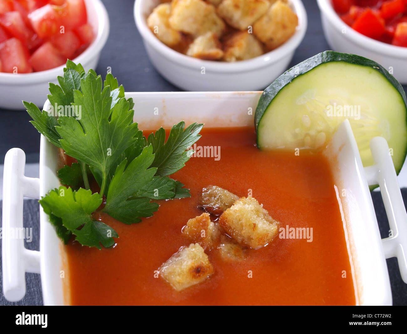 Gazpacho Andaluz. Is a raw vegetable soup native from the Spanish region Andalucia. It is served cold as starter. Stock Photo