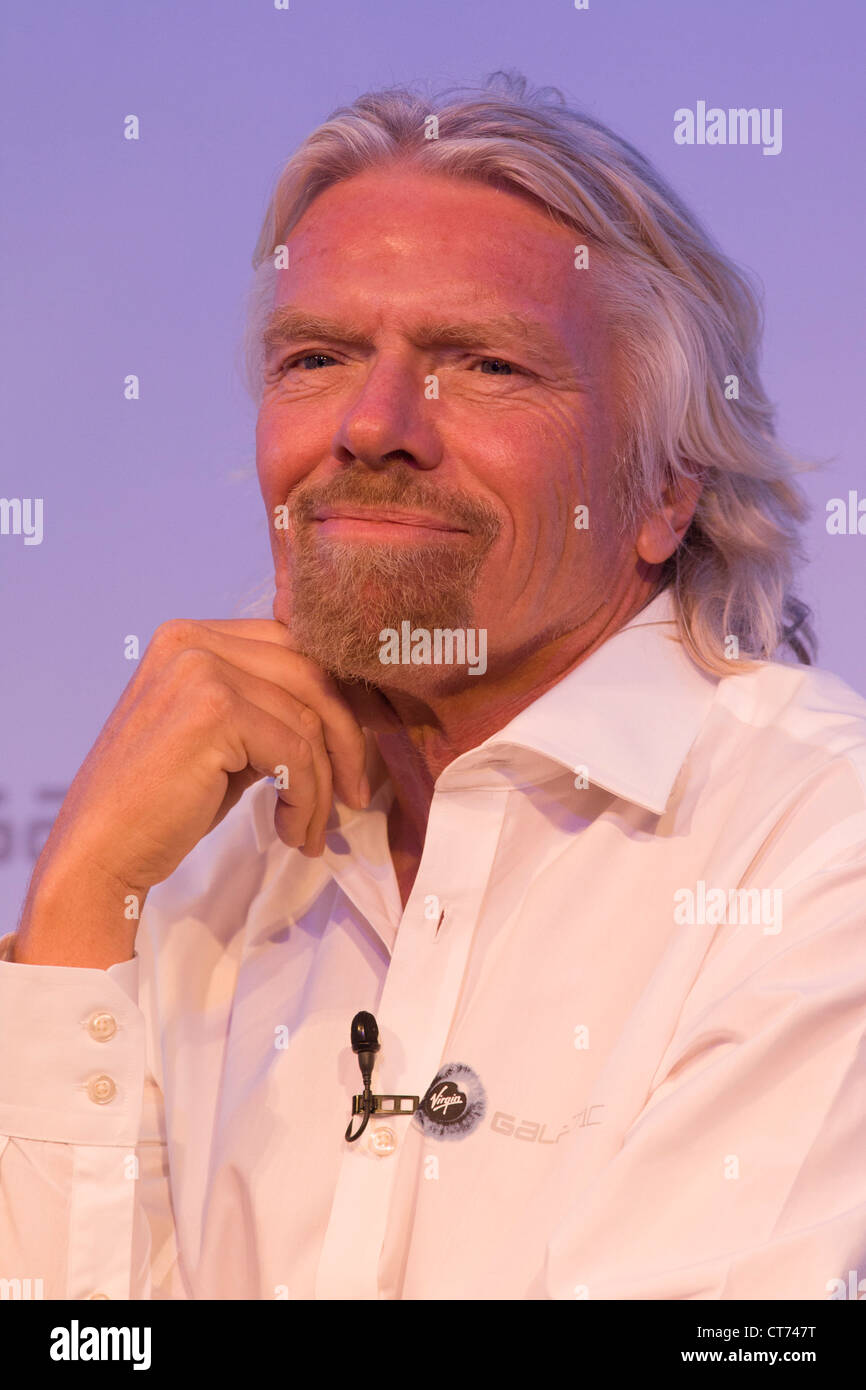 Sir Richard Branson speaks to audience during Virgin Galactic space tourism presentation at Farnborough Air Show. Stock Photo