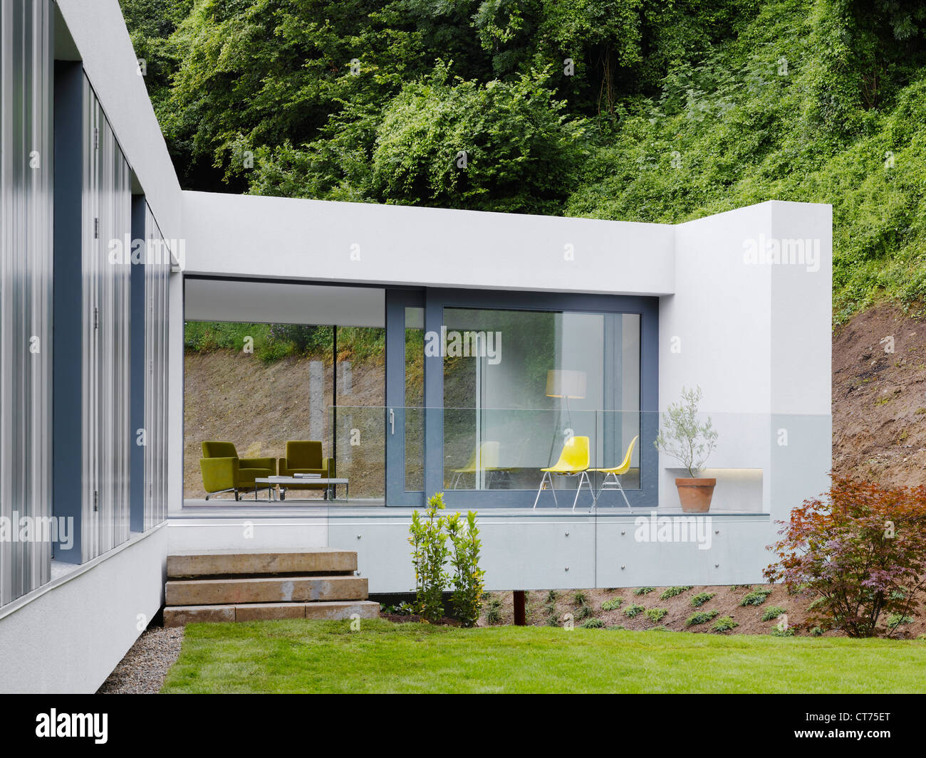 Private Residence Co. Wicklow, Enniskerry, Ireland. Architect: ODOS , 2008. View of back entrance showing outdoor terrace and do Stock Photo