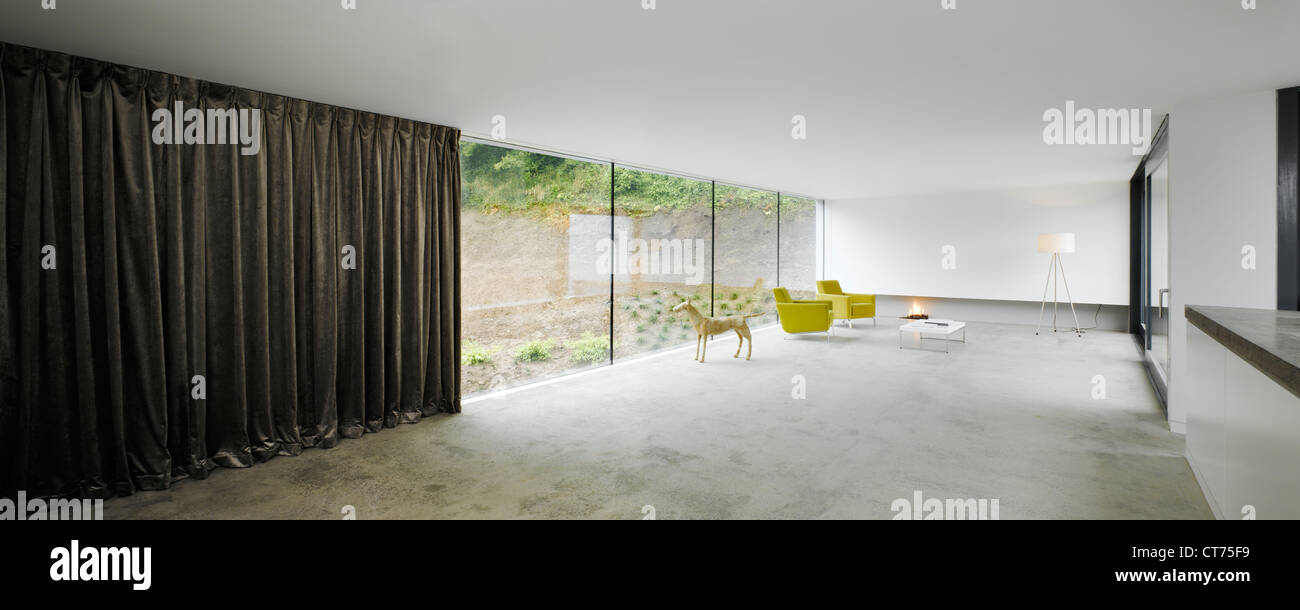 Private Residence Co. Wicklow, Enniskerry, Ireland. Architect: ODOS , 2008. View of living space showing seating. Stock Photo