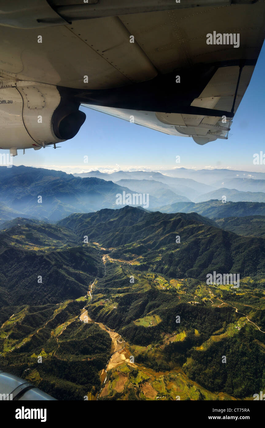 view from airplane at mountain range in Nepal Stock Photo