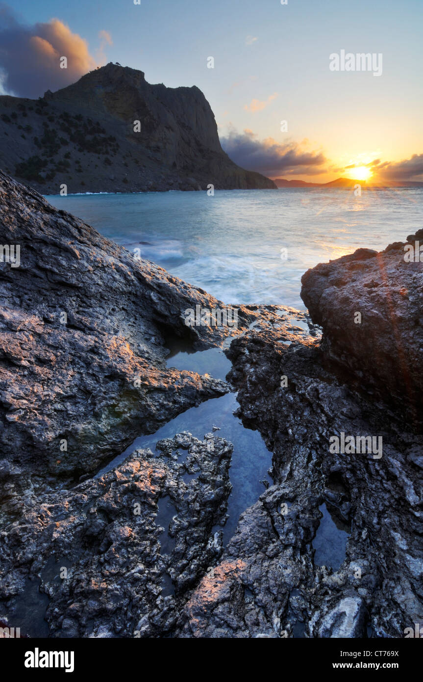 Black Sea coast on Crimea in Ukraine with Koba-Kaya Mountain Stock Photo