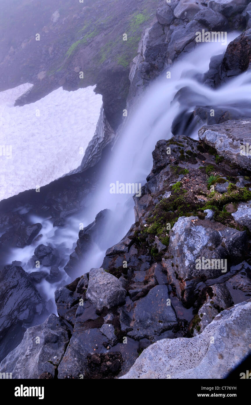 waterfall in Mutnovsky volcano area at dusk Stock Photo