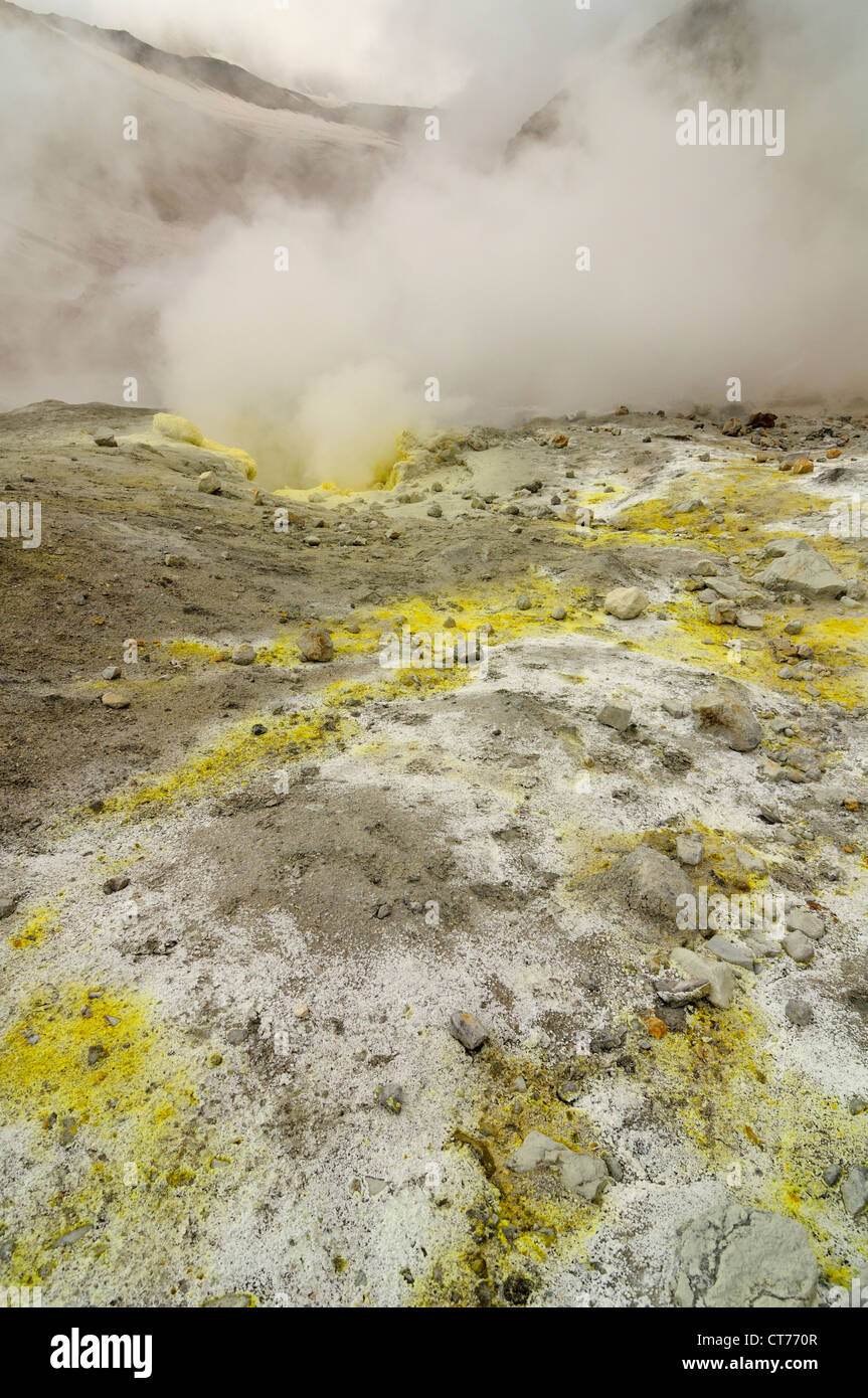 steam evaporating in Mutnovsky volcano area on Kamchatka Stock Photo