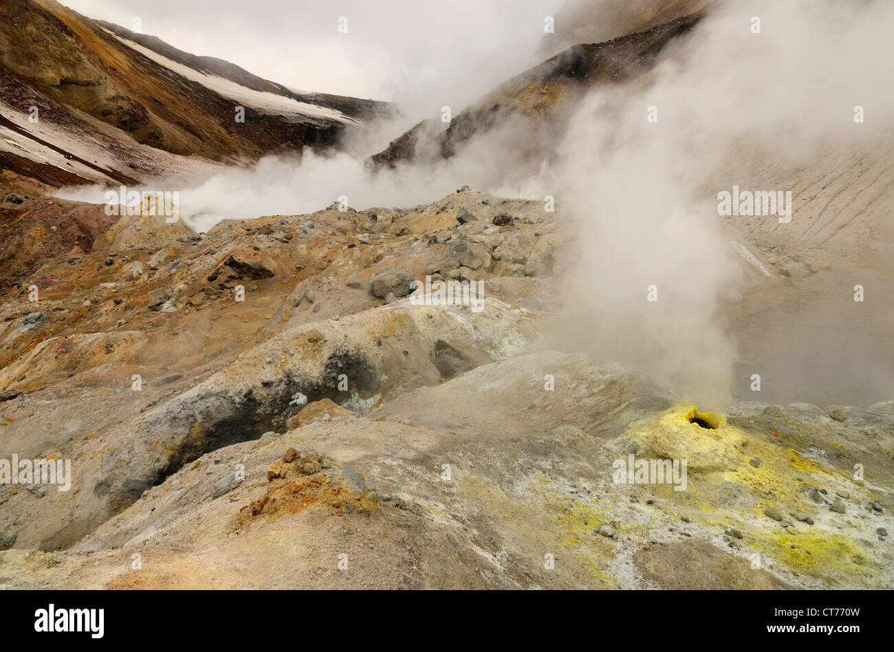 steam evaporating in Mutnovsky volcano area on Kamchatka Stock Photo