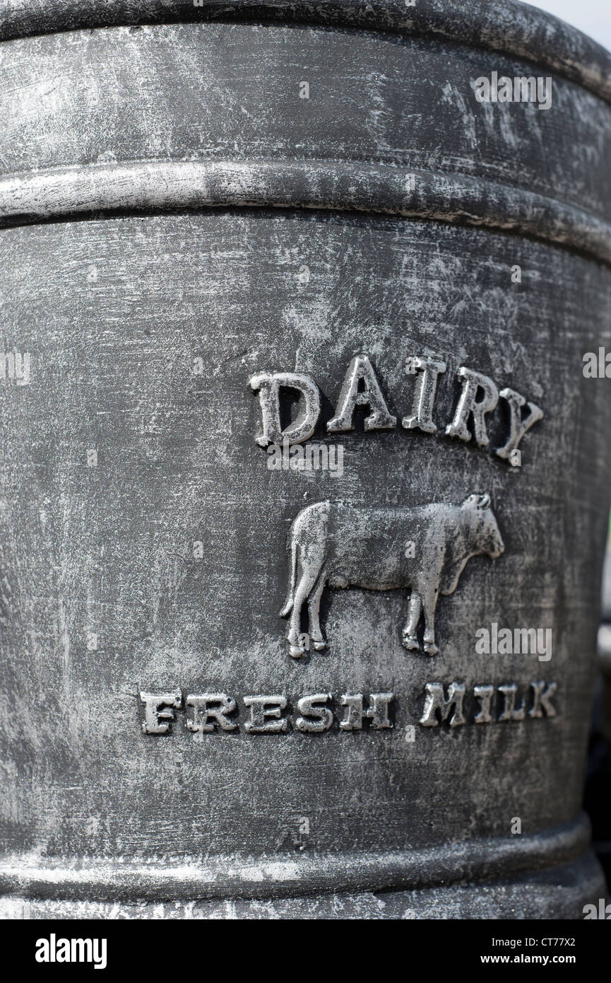 Close up detail of a milk churn with the words DAIRY FRESH MILK embossed on  it Stock Photo - Alamy