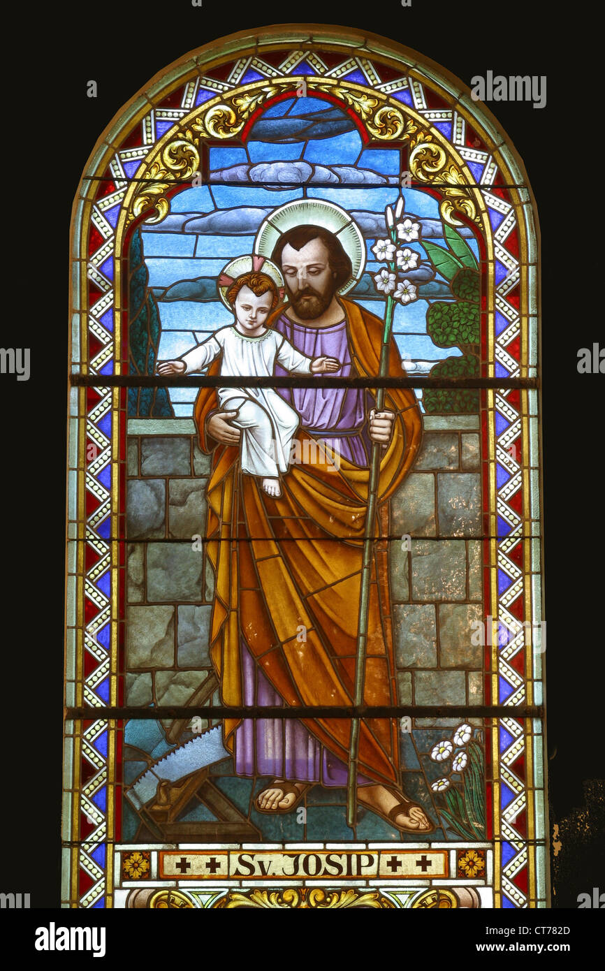 Saint Joseph holding baby Jesus Stock Photo - Alamy