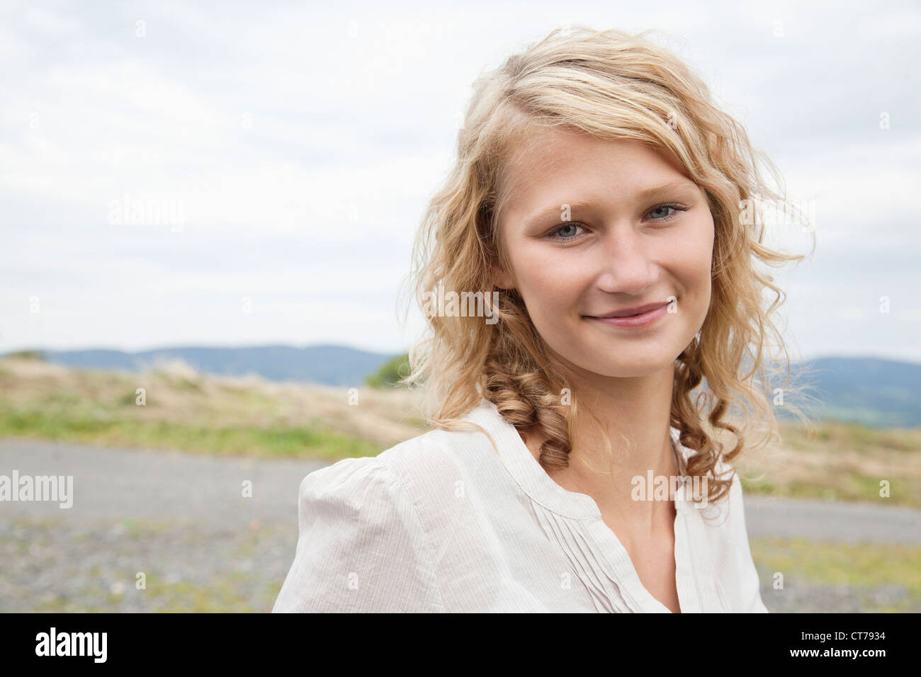 potrait of young woman outdoors Stock Photo