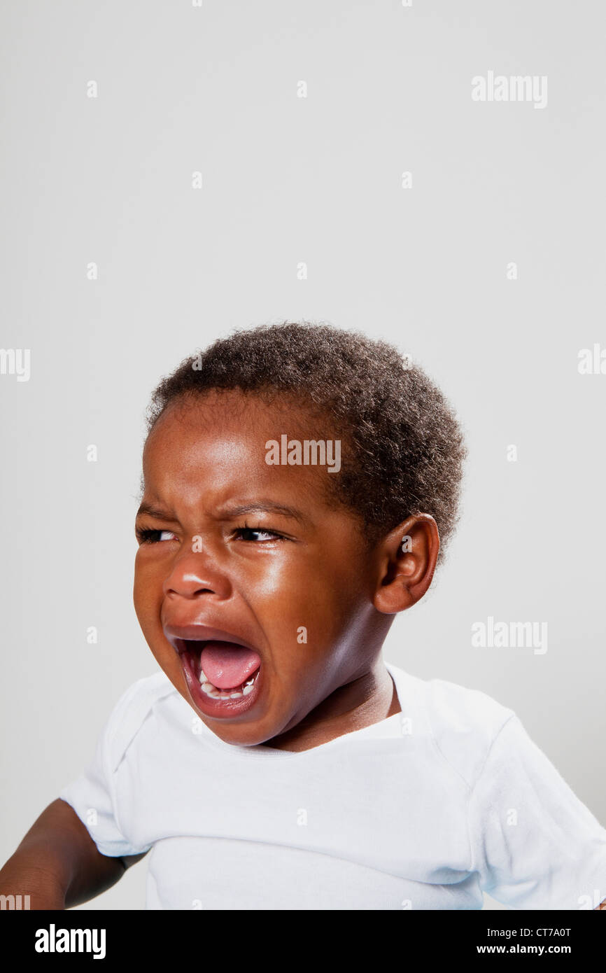 Crying Little Boy In The Park Stock Photo - Download Image 
