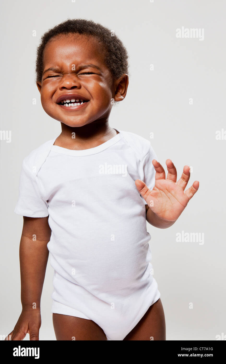 Boy pulling funny face Stock Photo - Alamy