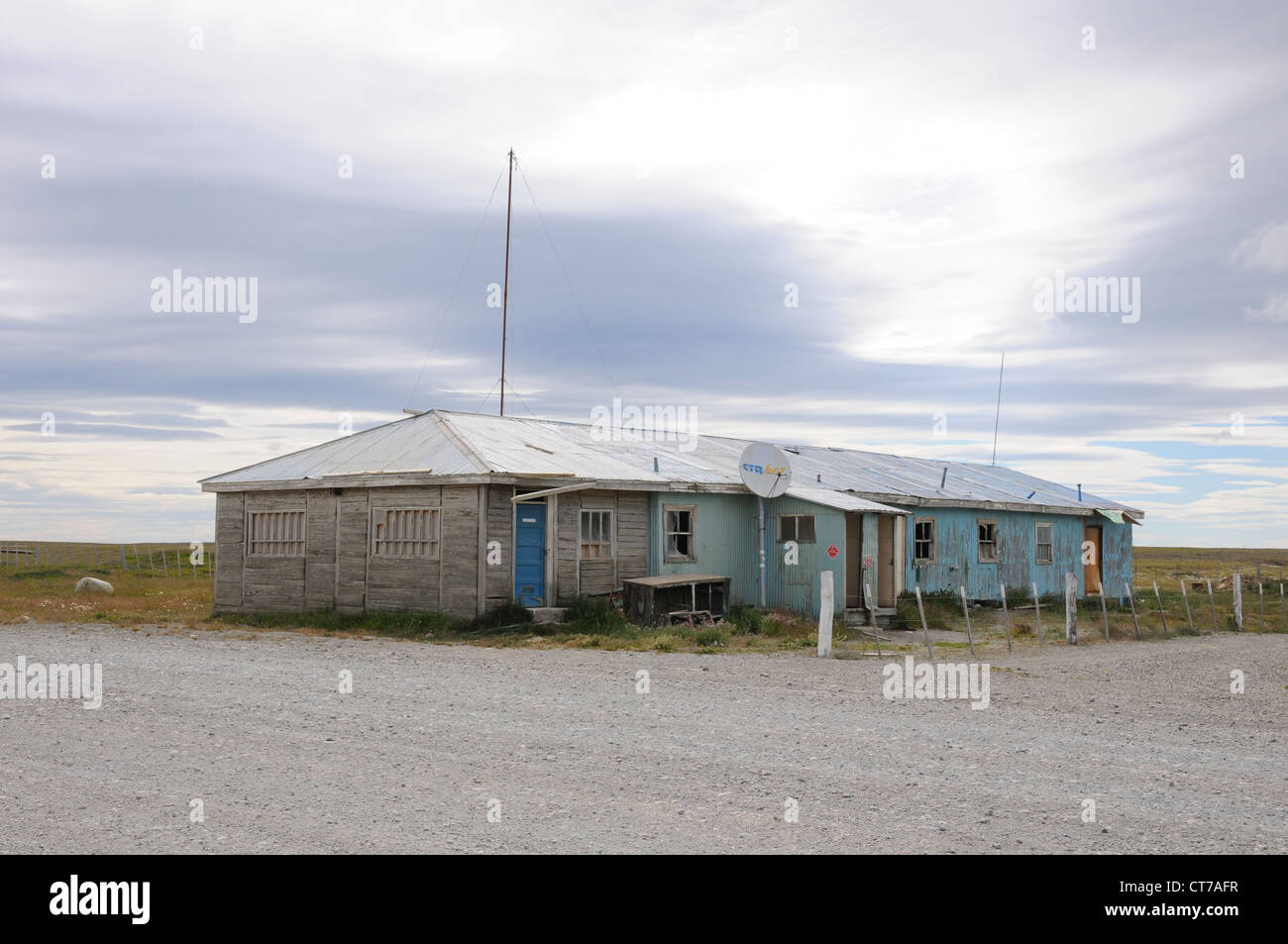 Dilapidated hut, tin and wood office building, remote landscape, Patagonia, Chile Stock Photo