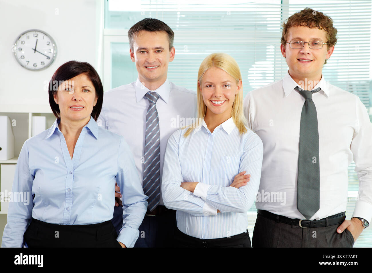 Cheerful happy employee smiles hi-res stock photography and images - Alamy
