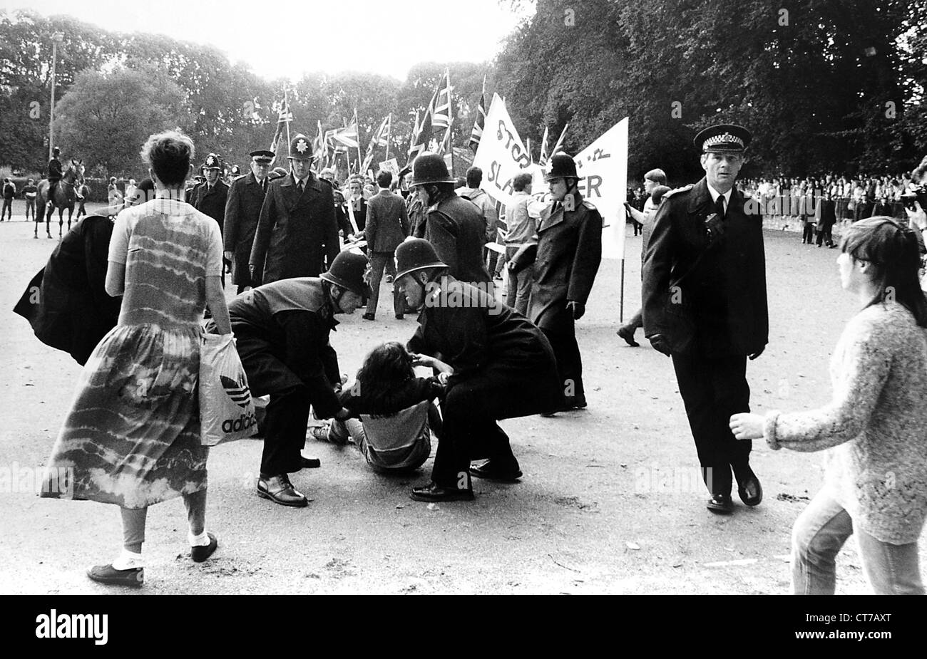 Police tussle with an anti Nazi  protestor  Brighton 1980s Stock Photo