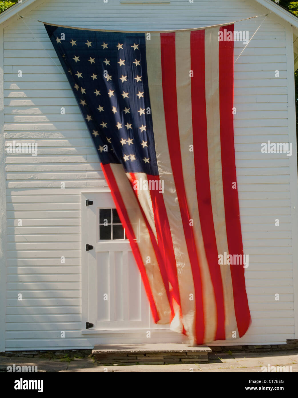 American flag on the front of a house Stock Photo