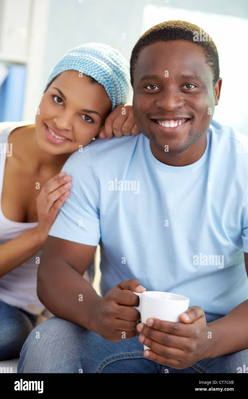 Image of young African couple looking at camera with smiles Stock Photo ...