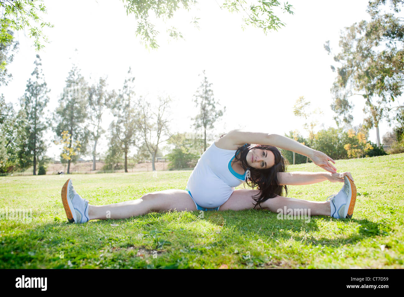 Young Stretch Routine Pregnant woman exercising arms legs hi-res stock photography and images ...