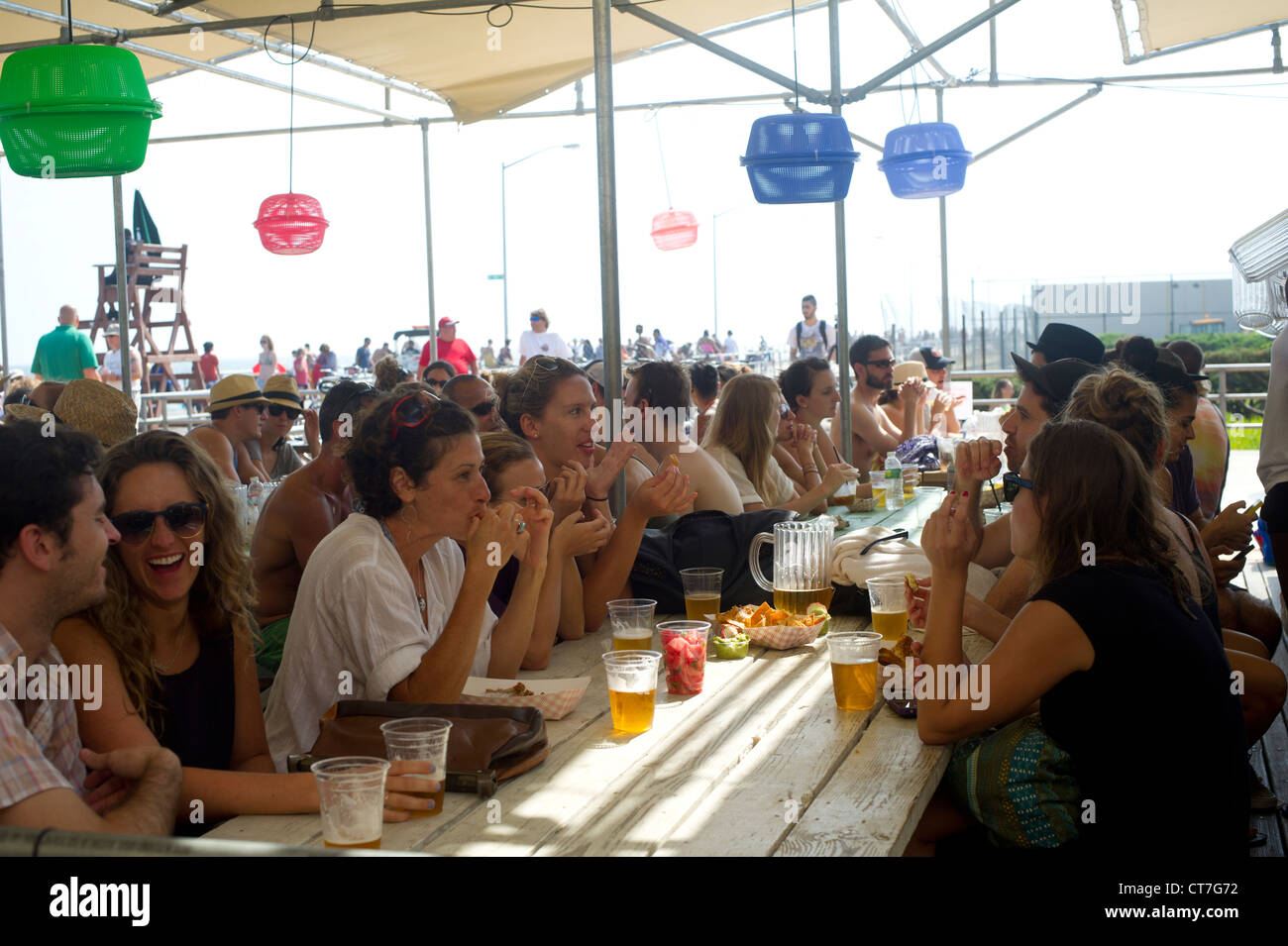 Concession stands on the boardwalk at Rockaway Beach in the Queens