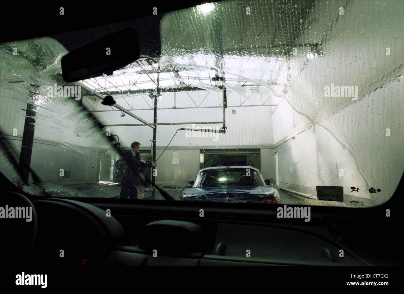 Berlin, a car drive through the car wash Stock Photo Alamy