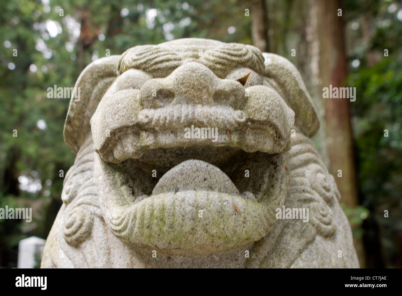 japanese stone statues in landscape