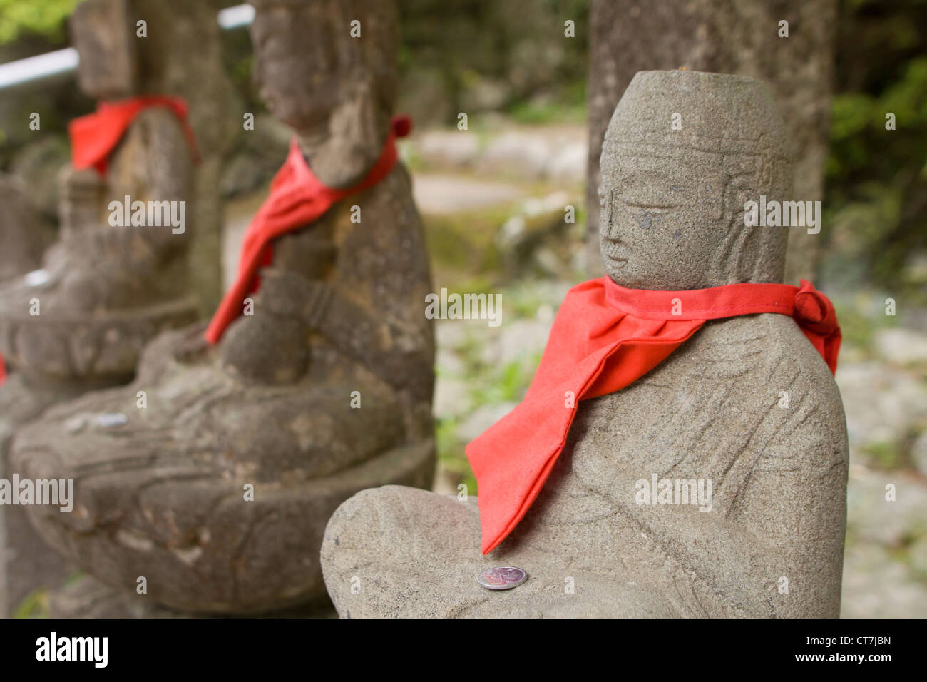 Japanese stone statues Stock Photo Alamy