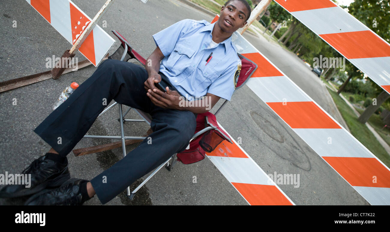 A young man works as a police intern in Shorewood, Wisconsin, USA Stock Photo