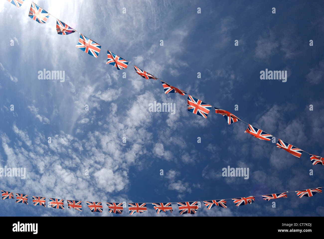 two strings of union jack bunting, east molesey, surrey, england Stock