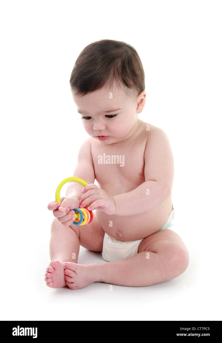 Baby playing with rattle Stock Photo Alamy