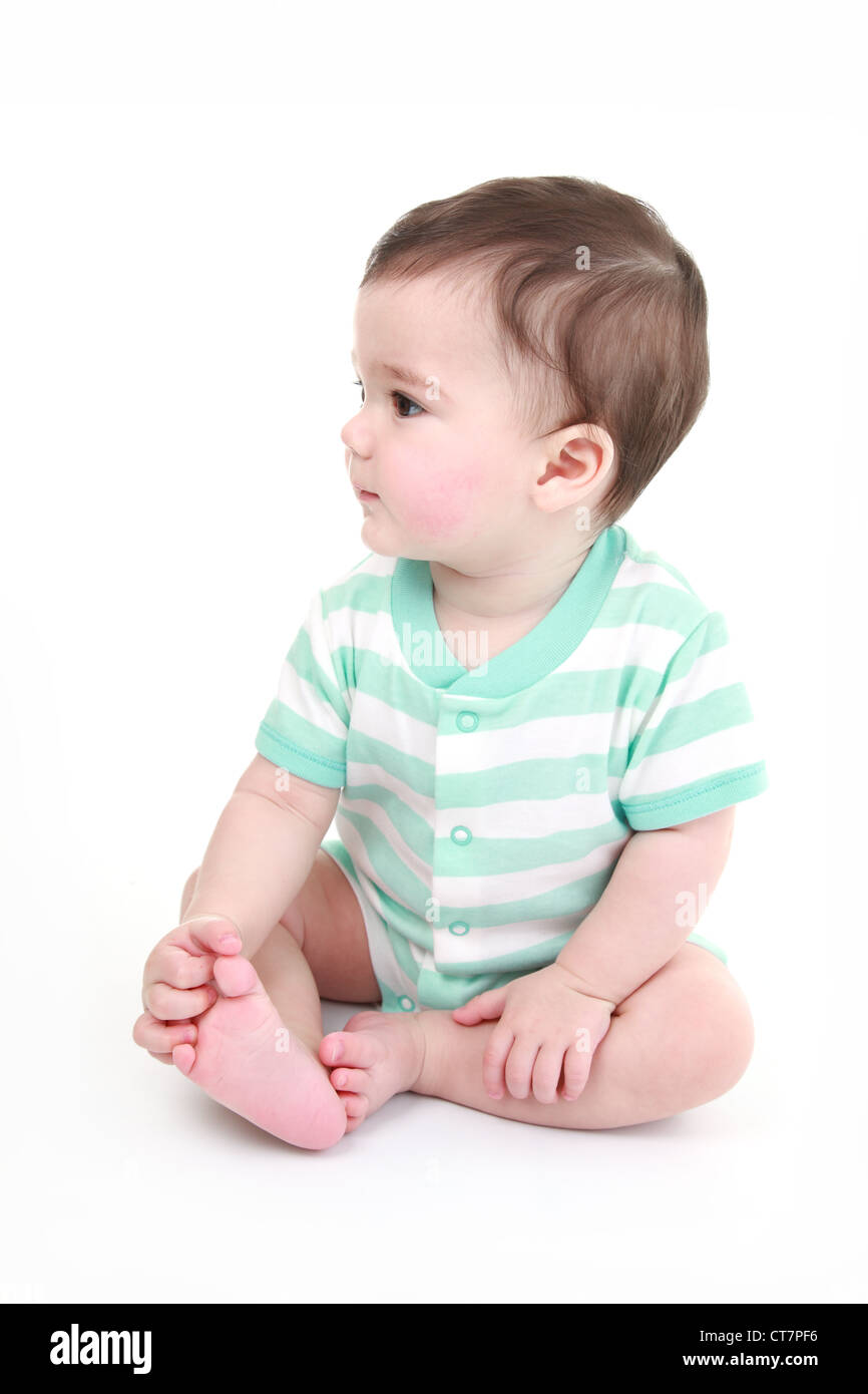Baby playing with his feet Stock Photo - Alamy