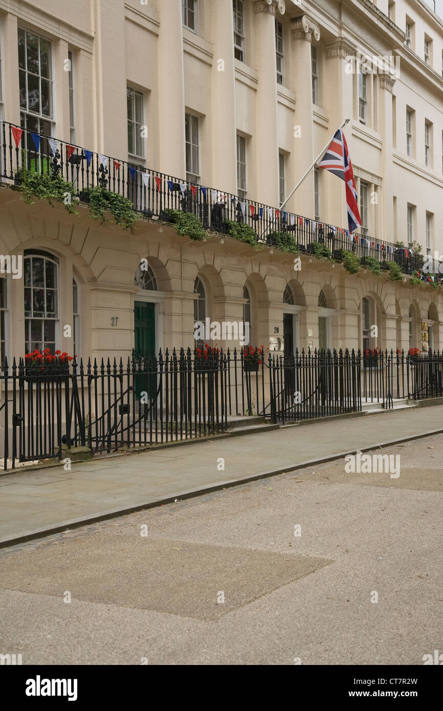 houses in London's Fitzroy Square with Union Jack bunting