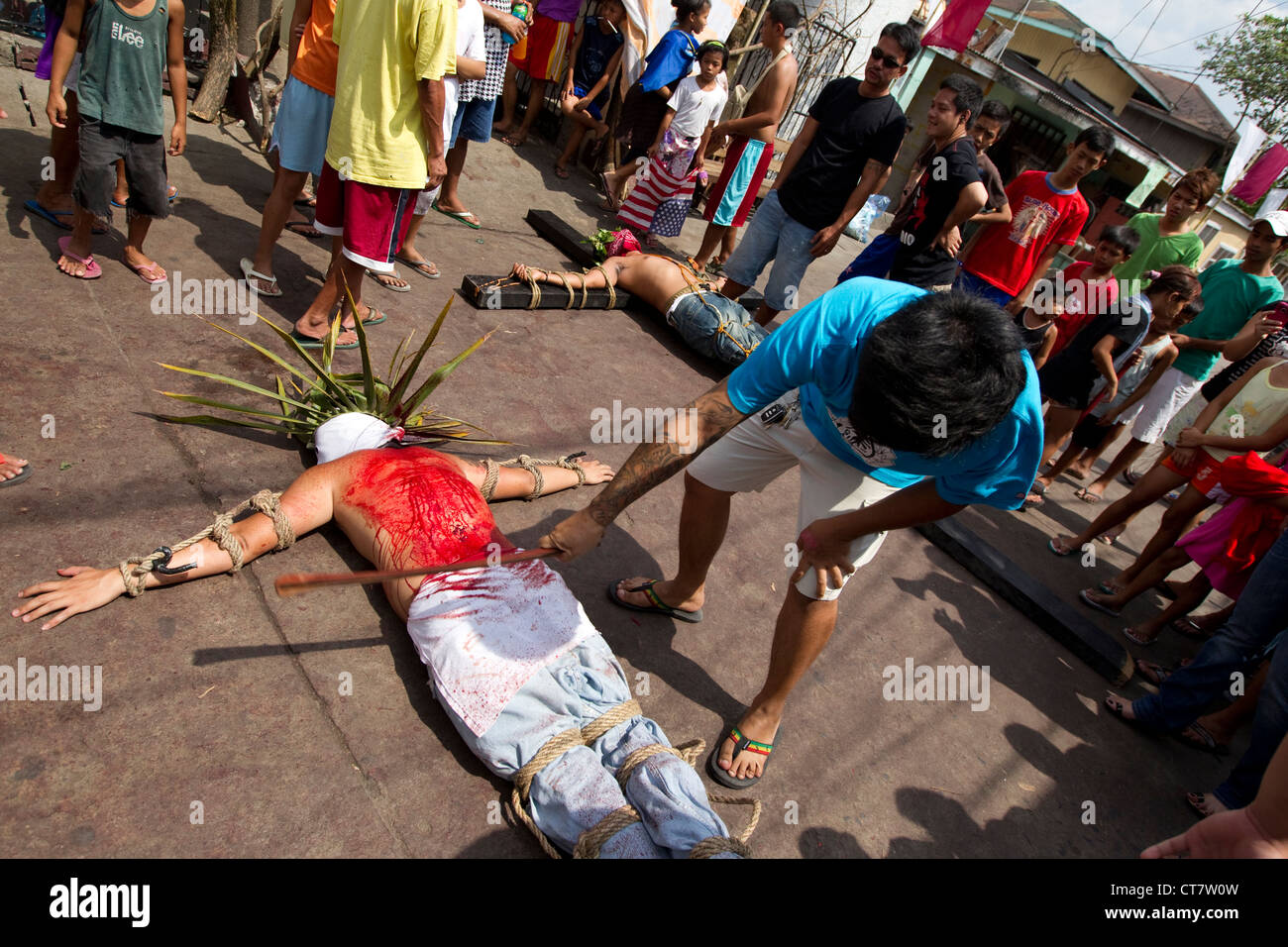 Flagellant beaten during Holy Week events;Lourdes Northwest;Angeles City;Pampanga;Philippines Stock Photo