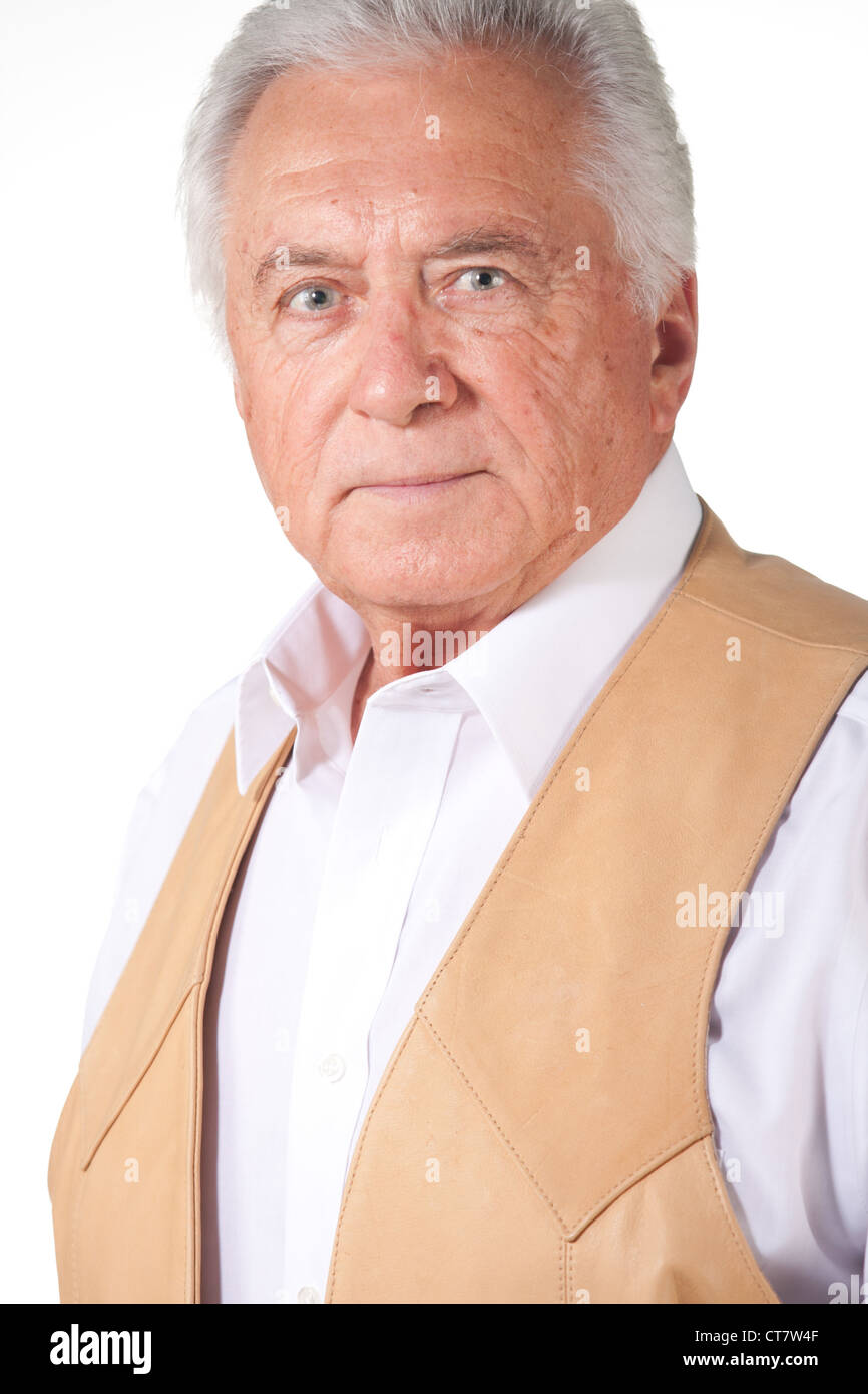 senior business man in leather vest Stock Photo