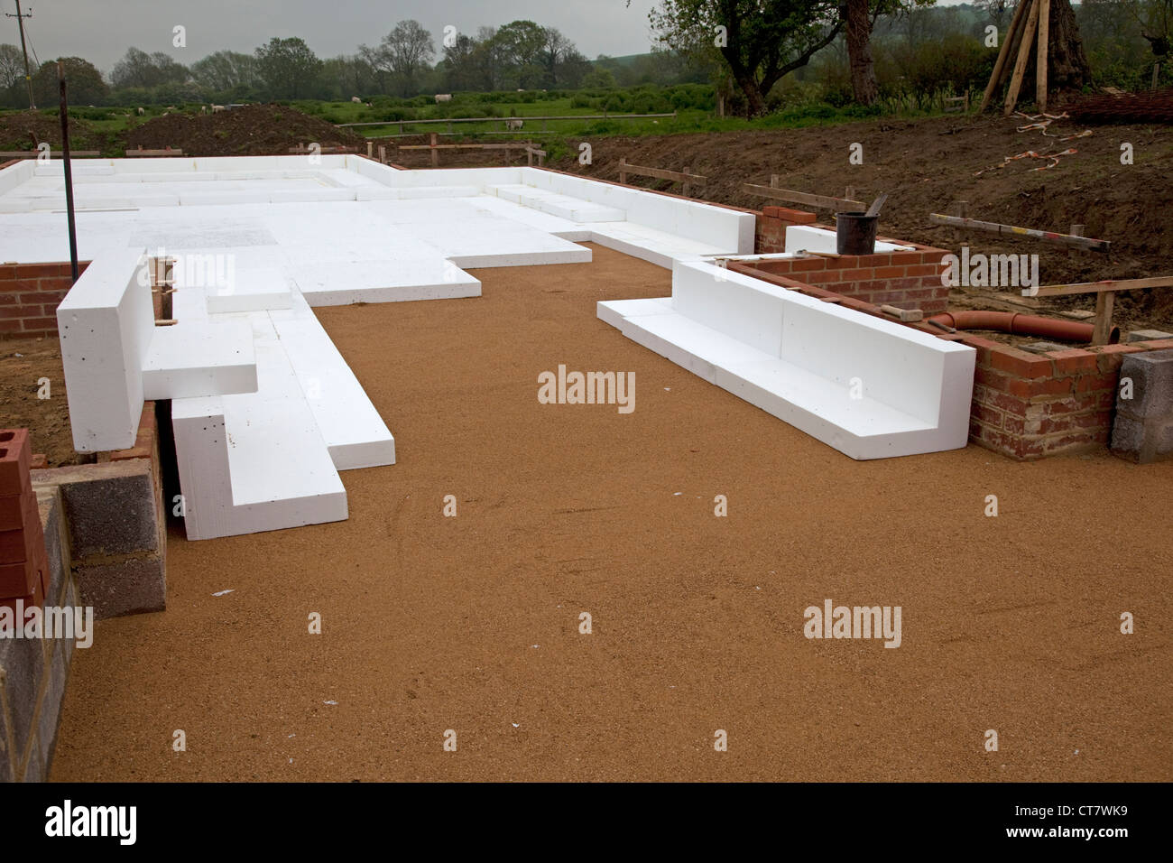 Laying ESP structural polystyrene as highly insulated layer on passive slab foundation UK Stock Photo