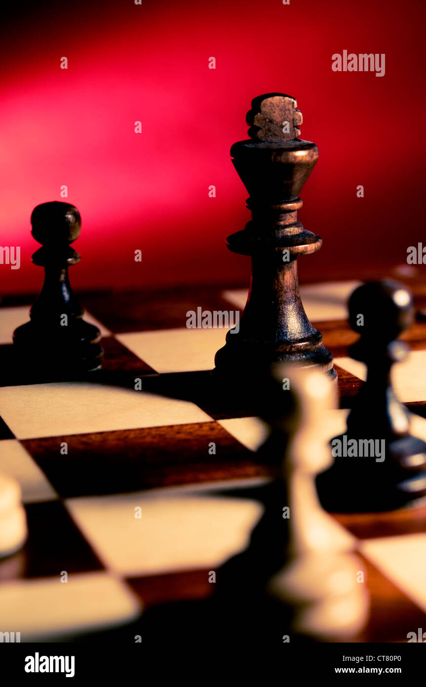 chess king and pawns Stock Photo