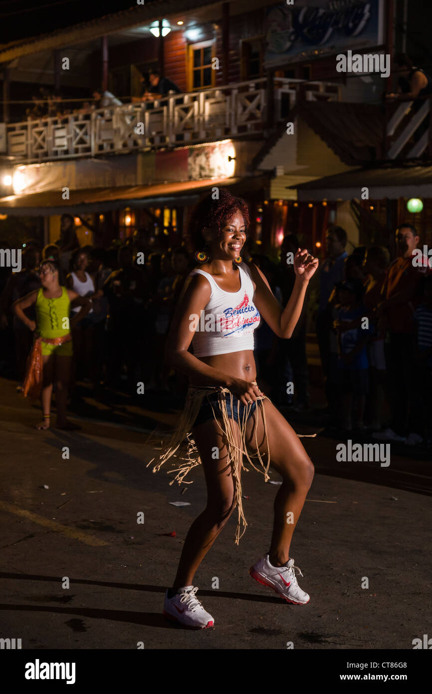 Dancing in the street during the Panamanian Carnival celebration on Isla Colon, Bocas del Toro, Panama. Stock Photo
