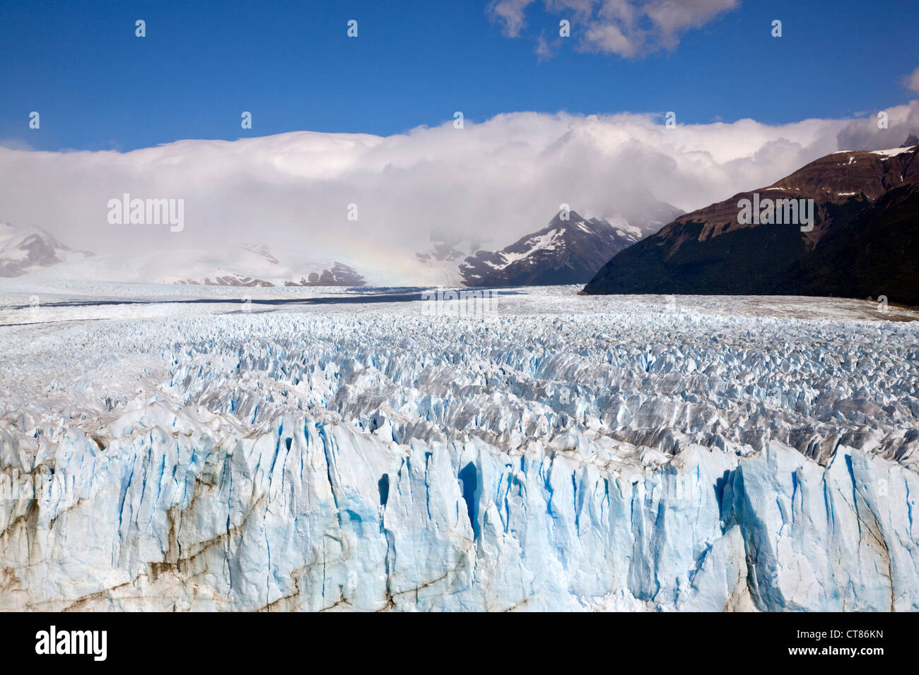 Detail of the Breaking Wall of the Glaciar Perito Moreno and the blue ice caverns Stock Photo