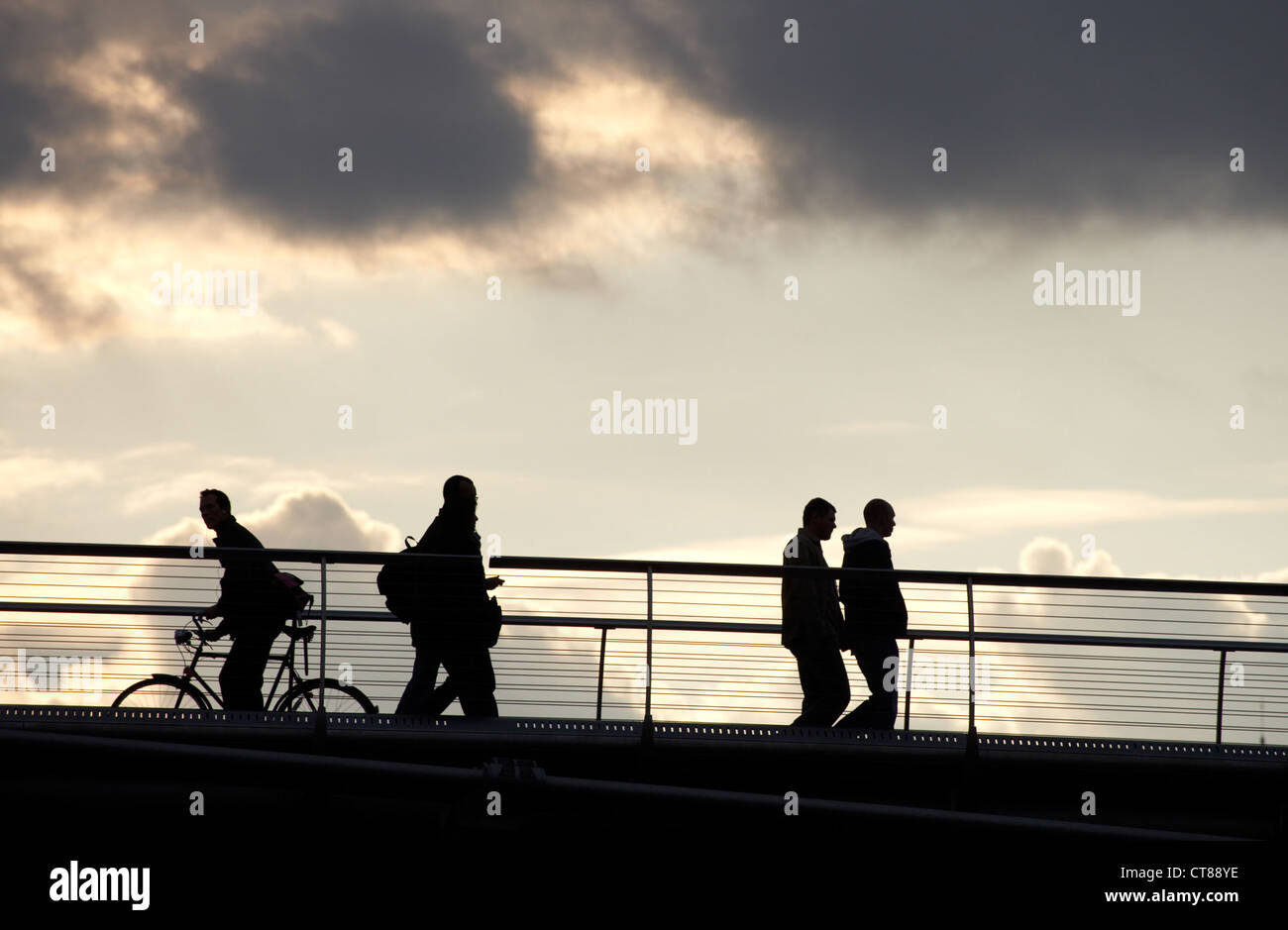 London - People as a silhouette on a bridge Stock Photo - Alamy