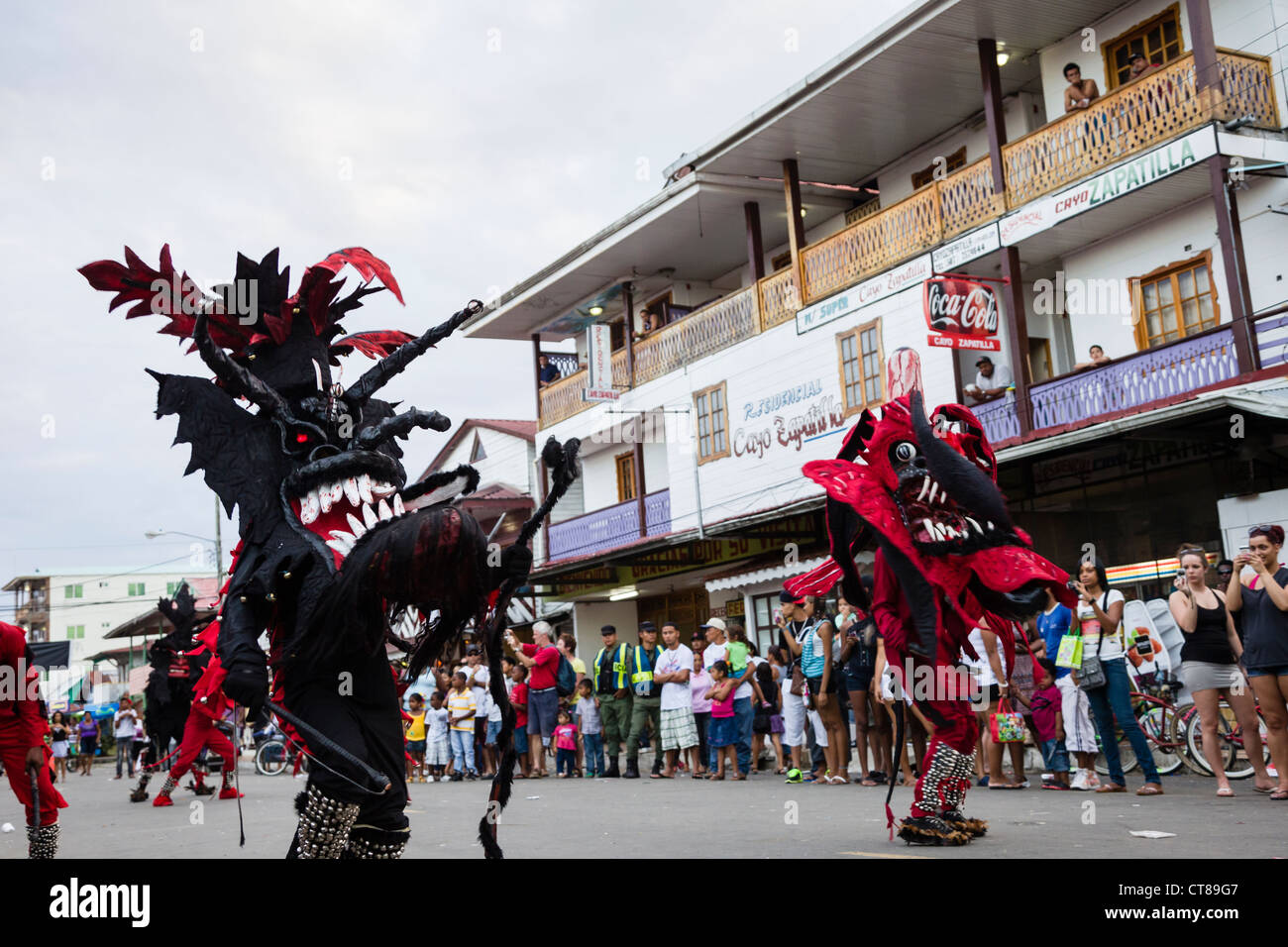 'Whipping Devils' patrol the streets during the Panamanian Carnival celebration on Isla Colon, Bocas del Toro, Panama. Stock Photo