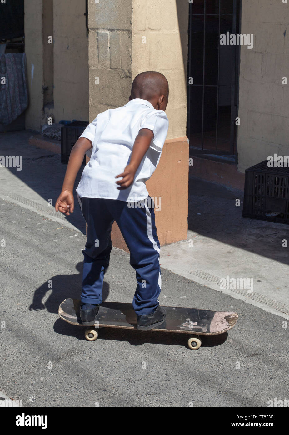 A young boy skateboards near his home in Langa African Township near Cape  Town, South Africa Stock Photo - Alamy