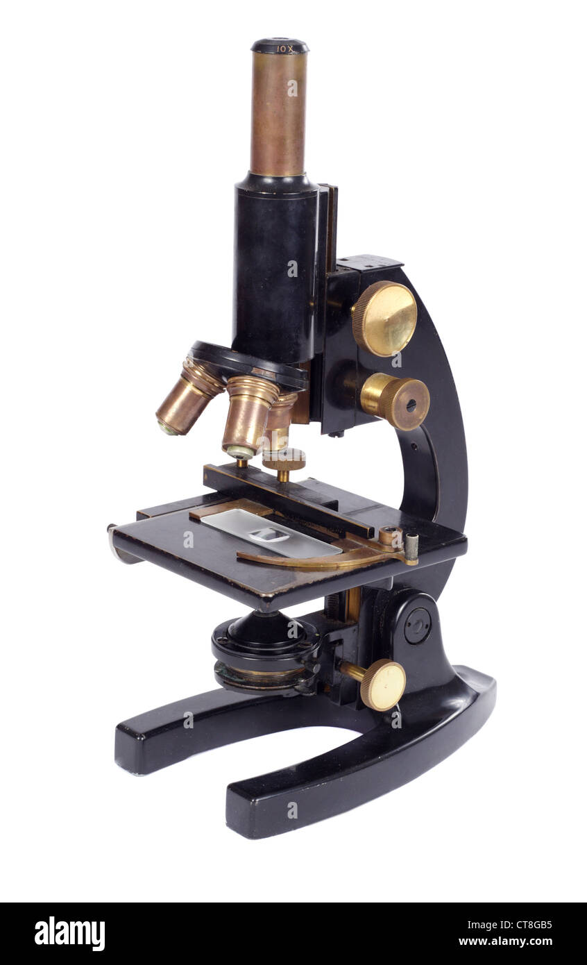 old microscope photo on the white background Stock Photo